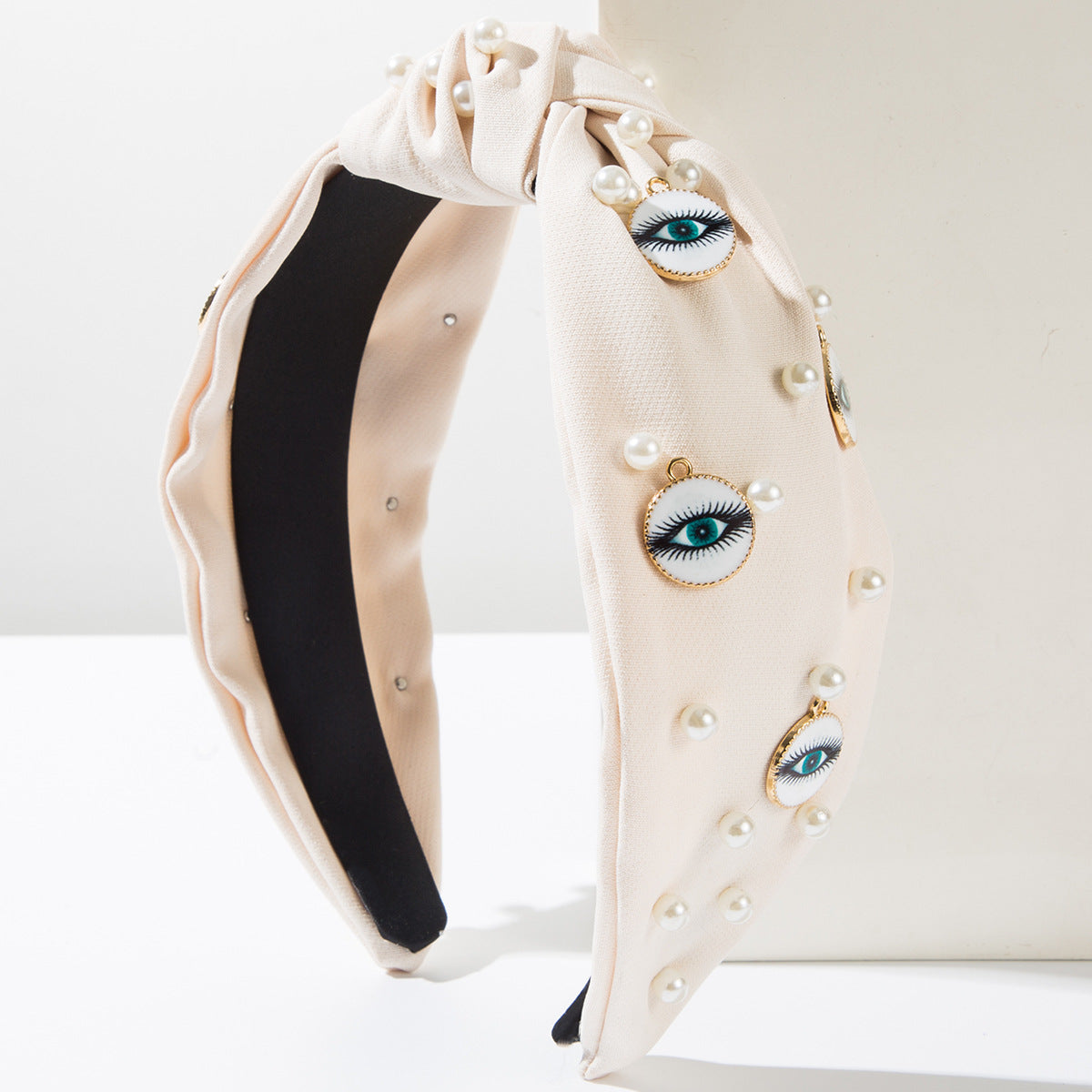 Wholesale Pearl round devil eye headband accessories